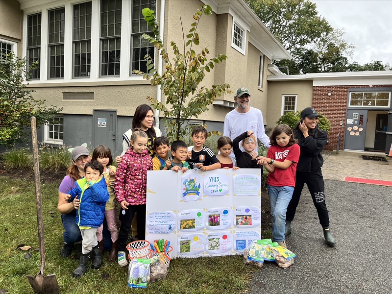 Students planting flower bulbs
